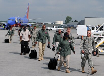 U.S. Army North Soldiers and civilians arrive at the Indianapolis International Airport July 12 and prepare to deploy to Camp Atterbury, Ind., to provide defense support in an exercise scenario based on the unthinkable — a 10-kiloton nuclear weapon exploding in a major U.S. city. Approximately 92 people from Joint Task Force – 51, Army North, based at Fort Sam Houston, Texas, augmented by disaster response personnel from the Army Reserve, Army National Guard, Air Force, Navy, Marines and others, set up a tactical operations center and began orchestrating a military support operation involving an initial 2,200 personnel from around the U.S. The force structure is projected to grow to 3,300 personnel by the end of the two-week exercise. 

