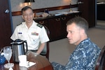 PETERSON AIR FORCE BASE, Colo. - Japanese Maj. Gen. Koichi Isobe, Japan Self Defense Force Joint Staff J5 Director, speaks with Navy Adm. James Winnefeld, North American Aerospace Defense Command and U.S. Northern Command commander, before the start of the Joint Staff Conference at NORAD and USNORTHCOM headquarters July 13. The Joint Staff Conference provides senior military leaders from both countries an opportunity to focus on the implications of possible future military scenarios and mutually educate both joint staffs in the areas of missile defense, cyberspace defense, space and joint air and sea battle. The conference ends Friday. (U.S. Air Force photo by Staff Sgt. Thomas J. Doscher)