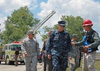 Adm. James Winnefeld Jr., commander of North American Aerospace Defense Command and U.S. Northern Command, visits the Muscatatuck Urban Training Center in Butlerville, Ind., July 16 to observe the Vibrant Response 10.2 field training exercise, a national emergency response exercise aimed at preparing first responders for the unthinkable – a nuclear blast in a major U.S. city. The exercise is facilitated by U.S. Army North's Joint Task Force – 51, headquartered in San Antonio. 

