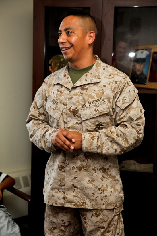 130701-M-YG378-023 MARINE CORPS BASE CAMP PENDLETON, Calif. (July 1, 2013) Newly promoted Lt. Col. Raul Rizzo, senior intelligence officer, 15th Marine Expeditionary Unit, addresses the unit’s staff officers after being promoted to his present rank in the unit’s conference room on Marine Corps Base Camp Pendleton, Calif., July 1. The 15th MEU recently returned from an eight-month deployment to the Western Pacific. Rizzo, 41, is from Myrtle Beach, S.C. (U.S. Marine Corps photo by Sgt. John Robbart III/Released)