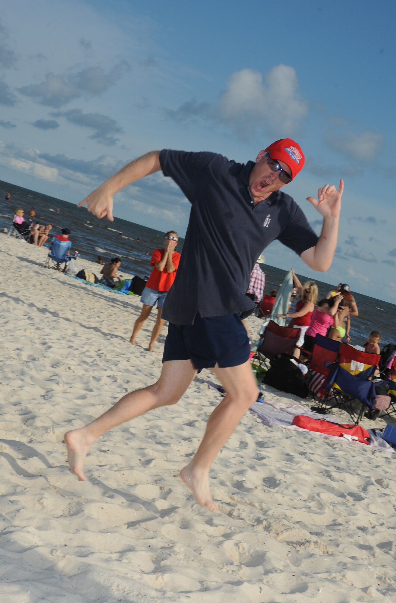 Lt. Col. Jonathan Wright, 81st Mission Support Group, poses for a photo at Keesler’s 4th of July Beach Bash, July 4, 2013, on the Biloxi Beach.  The event, held in honor of our nation’s Independence Day, included food, games, music, contests and fireworks.  (U.S. Air Force photo by Kemberly Groue)