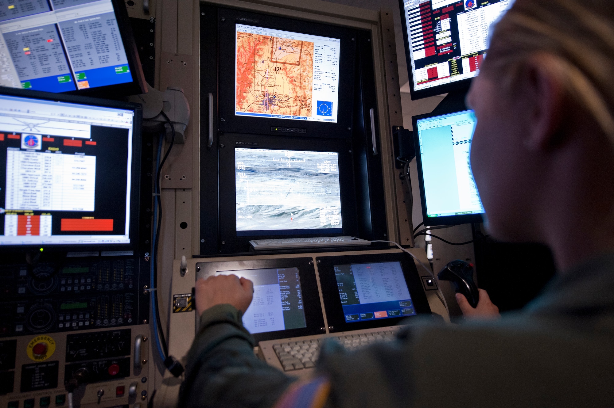 Chelsea Cogswell, U.S. Air Force Academy cadet, operates the Remotely Piloted Aircraft simulator at Holloman Air Force Base, N.M., July 2. The cadets spent two weeks at Holloman to gain insight on their career options after the academy. (U.S. Air Force photo by Airman 1st Class Aaron Montoya/Released)