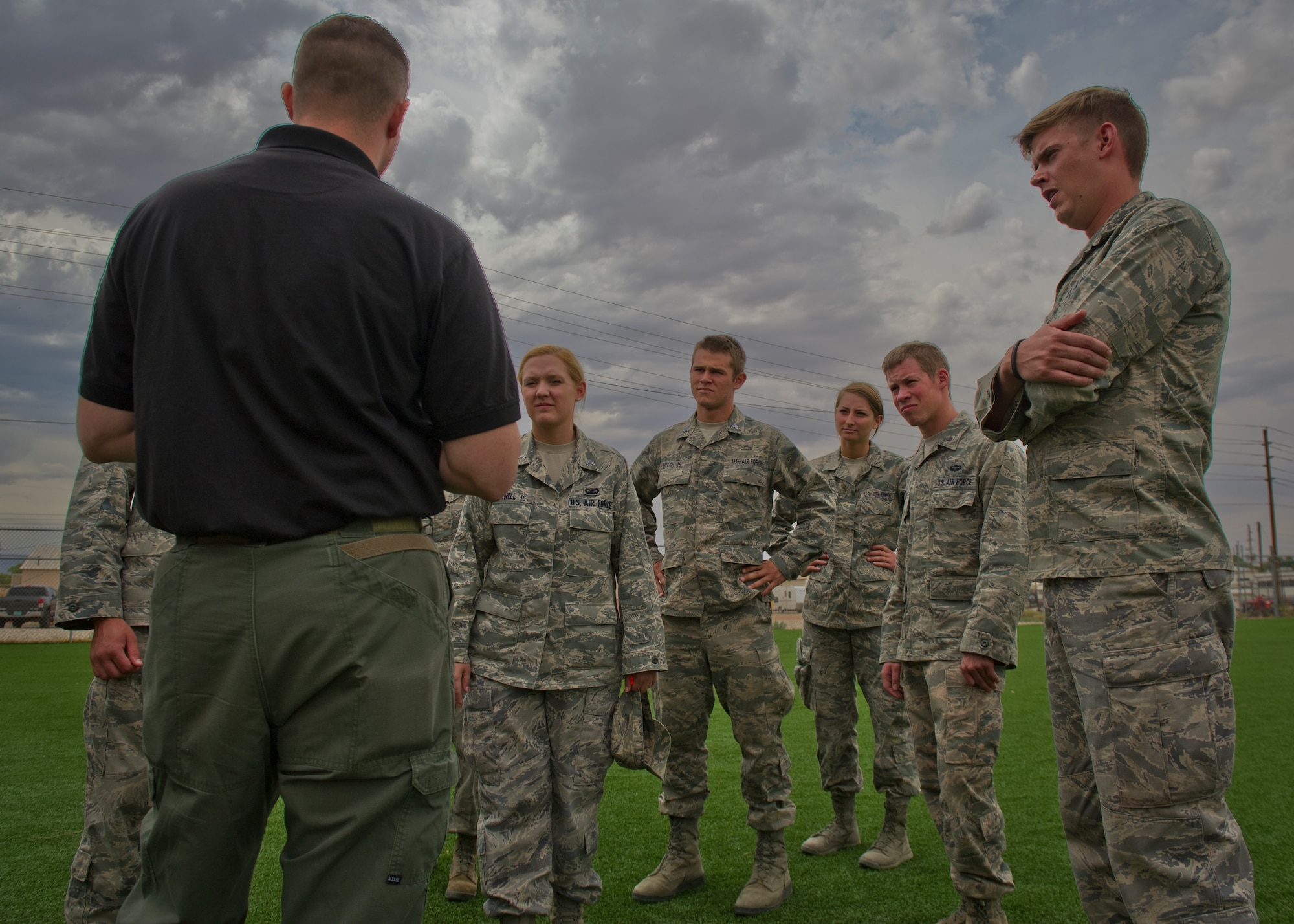 Staff Sgt. Zachary Burtt, 49th Security Forces Squadron Military Working Dog handler, briefs a group of U.S. Air Force Academy Cadets on safety procedures at Holloman Air Force Base, N.M., June 28. The cadets spent two weeks at Holloman to gain insight on their career options after the academy. (U.S. Air Force photo by Airman 1st Class Aaron Montoya/Released)