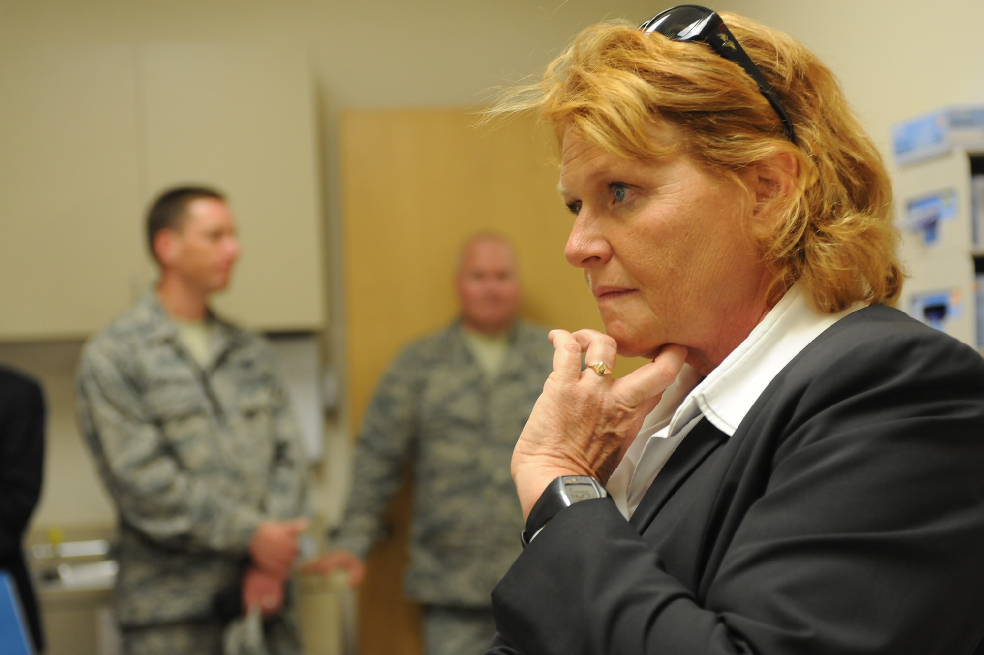 North Dakota Senator Heidi Heitkamp, visits the staff of the Veterans Affairs Clinic, and discusses policies and challenges for the facility at Minot Air Force Base, N.D., June 28. The tour of the base clinic is one of several visits she will be making to veterans facilities across the state to assess the establishments strengths and short comings. While at the base, Heitkamp was able to meet veterans and their families face to face and learn firsthand about the care and assistance that they are able to receive at the base VA clinic. (U.S. Air Force photo/Airman 1st Class Stephanie Ashley)