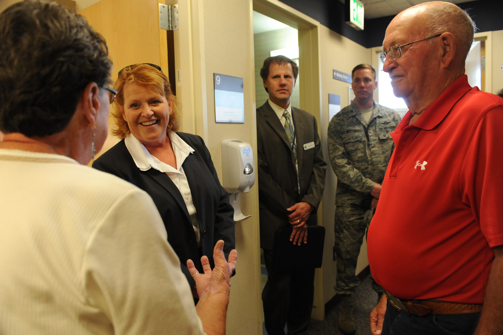 North Dakota Senator Heidi Heitkamp, visits the staff of the Veterans Affairs Clinic, and discusses policies and challenges for the facility at Minot Air Force Base, N.D., June 28. The tour of the base clinic is one of several visits she will be making to veterans facilities across the state to assess the establishments strengths and short comings. While at the base, Heitkamp was able to meet veterans and their families face to face and learn firsthand about the care and assistance that they are able to receive at the base VA clinic. (U.S. Air Force photo/Airman 1st Class Stephanie Ashley)