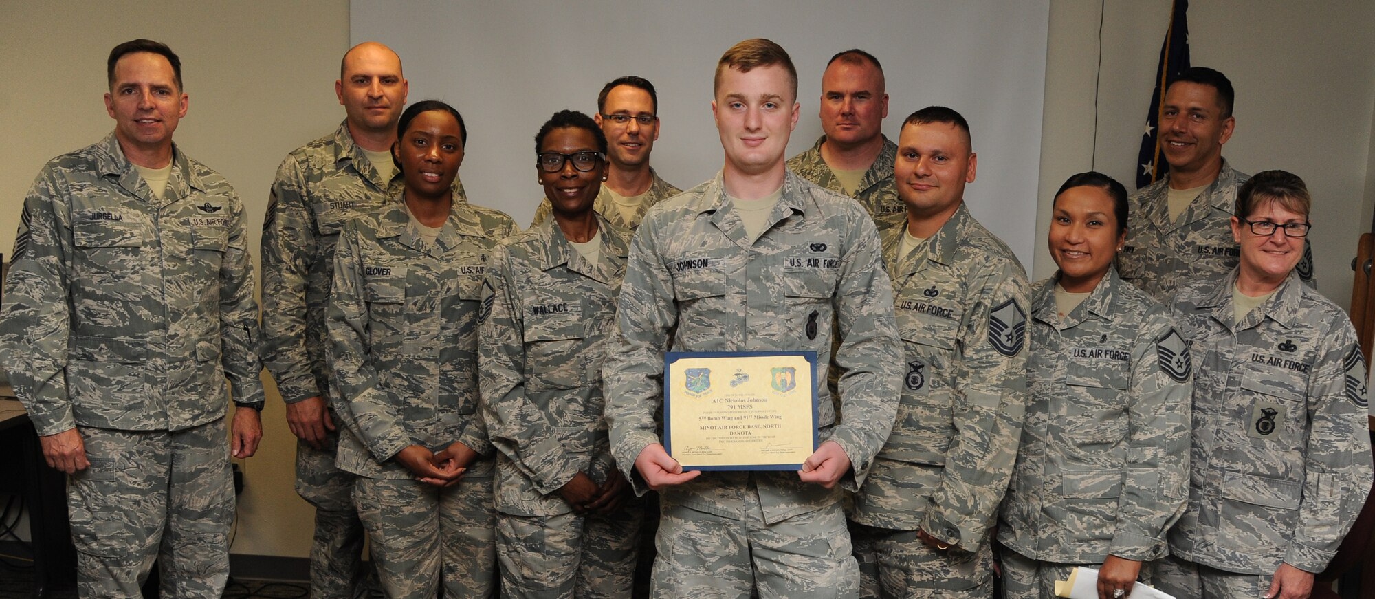 The Minot Air Force Base Top-3 would like to recognize Airman 1st Class Nickolas Johnson, 791st Missile Security Forces Squadron Response Force Leader, for his commitment to the Minot Team.  His display of professionalism and excellence went above and beyond while supporting the 5th Bomb Wing and 91st Missile Wing missions. Airman Johnson led his MK-19 and M-240B fire teams during 300 hours of penetrated site and open launcher security in support of maintenance operations, meeting the President of the United States’ intent of a “Safe, Secure, and Effective” nuclear weapons. Additionally, he was crucial to the first ever 219th Air National Guard SFS Nuclear Weapon Recapture/Recovery Wing Exercise. He was quickly able to integrate with the only certified Nuclear Air Guard Security Forces unit in the Air Force with his M-240B mobile fire team, which was instrumental providing superior fire power for assault forces and was lauded by the Adjutant General of North Dakota. Airman Johnson was also recognized and “coined” by the 20th Air Force Command Chief for his demonstration of SF duties to the Headquarters Air Force A4/6 team. He also completed two Department of Homeland Security Active Shooter courses and was awarded six continued education units. Airman Johnson was also a squadron representative for the Horn of Africa school supplies donations project.  The base was able to contribute over 100 pounds of school supplies to those in need in the Horn of Africa Area of Responsibility and was awarded a certificate of appreciation from the 768th Expeditionary Air Base Squadron Commander. His leadership resulted with him being awarded senior airman below-the-zone.  Airman Johnson is truly an asset to our squadron, Minot AFB and the Air Force. (U.S. Air Force photo/Airman 1st Class Andrew Crawford)