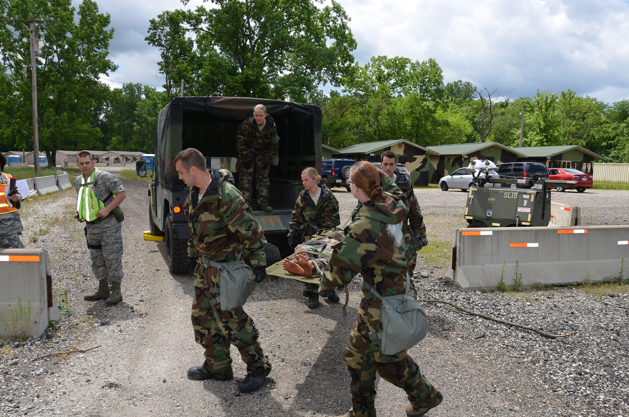 WRIGHT-PATTERSON AIR FORCE BASE, Ohio – Reservists from the 445th Aeromedical Staging Squadron practice loading a simulated patient into an ambulance during a mobility training exercise at the Warfighter Training Center June 2. (U.S. Air Force photo/Master Sgt. Charlie Miller)