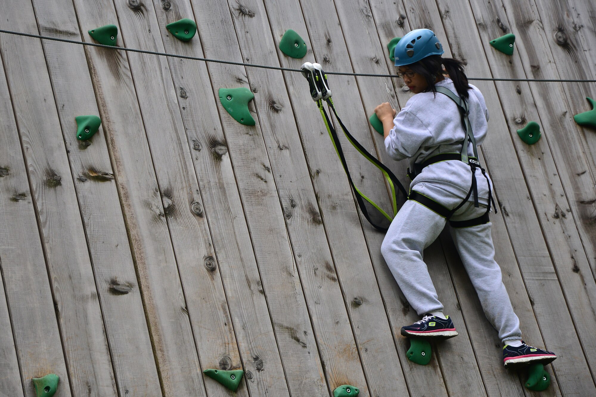 An Air Force Junior Reserve Officers’ Training Corps cadet negotiates an obstacle at a ropes’ course June 25, 2013, Grafenwoehr, Germany. Sixty-six high school students from around Europe attended the Air Force Junior Reserve Officers’ Training Corps summer program June 23-29. According to its website, the JROTC objectives are to educate and train high school cadets in citizenship, promote community service, instill responsibility, character, and self-discipline, and provide instruction in air and space fundamentals. (U.S. Air Force photo/Tech. Sgt. Chad Thompson)
