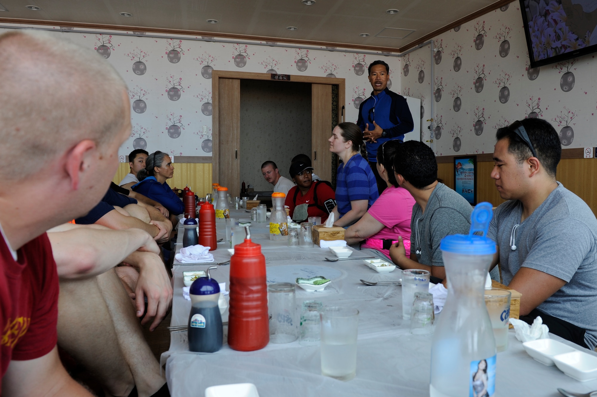 GUNSAN CITY, Republic of Korea – Chaplain (Capt.) Mario Rosario, 8th Fighter Wing Chapel, speaks to Wolf Pack Airmen about resiliency during a retreat workshop at a restaurant, in Gunsan City, Republic of Korea, June 28, 2013. Fifteen Wolf Pack Airmen took part in the program hosted by the Airman and Family Readiness Center and base chapel. (U.S. Air Force photo by Staff Sgt. Tong Duong.)