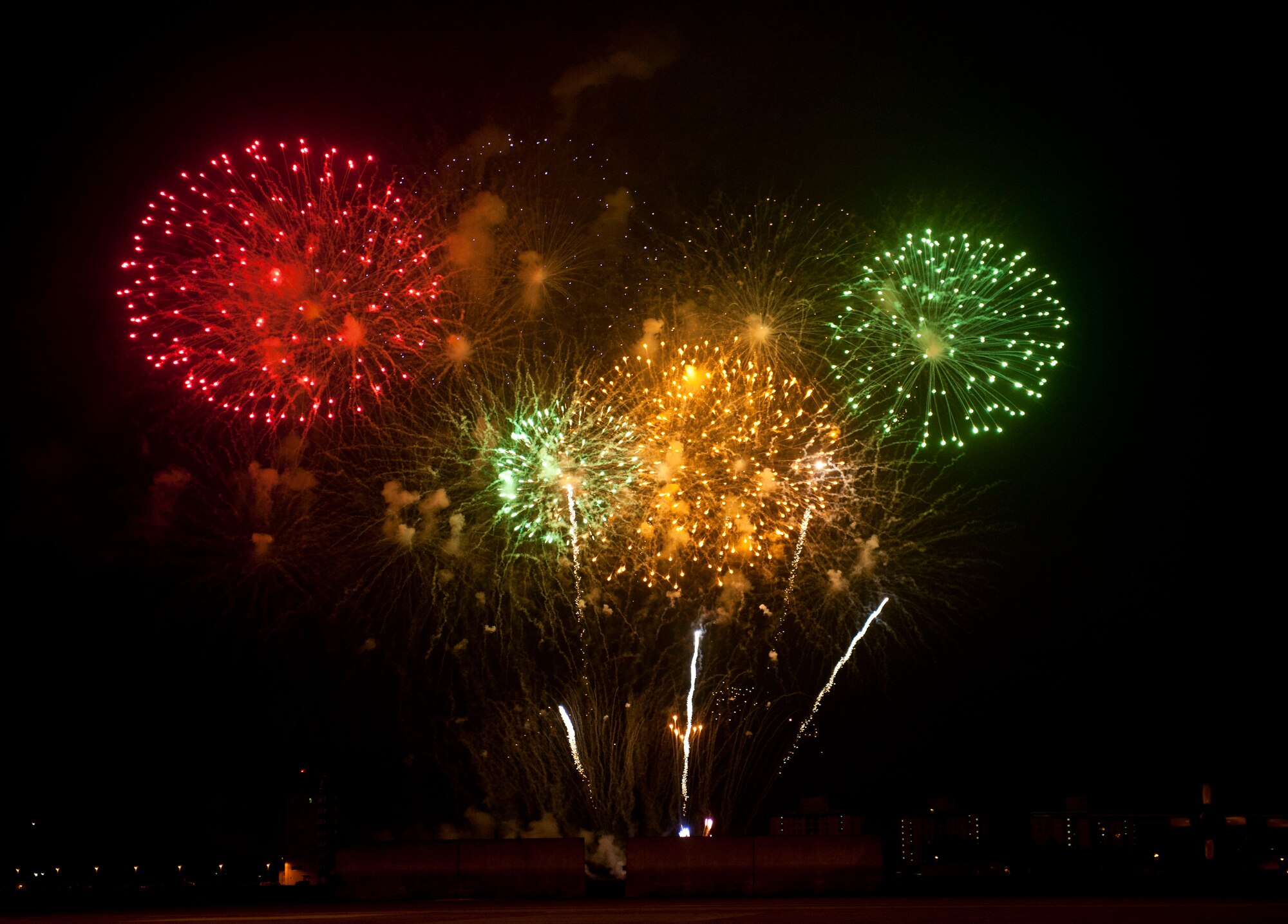 YOKOTA AIR BASE, Japan -- A series of fireworks explode at the end of Celebrate America on July 4, 2013 at Yokota Air Base, Japan. A performance by the Lt. Dan Band and fireworks ended the night after a patriotic day of activities. (U.S. Air Force photo by Airman 1st Class photo by Meagan Schutter)