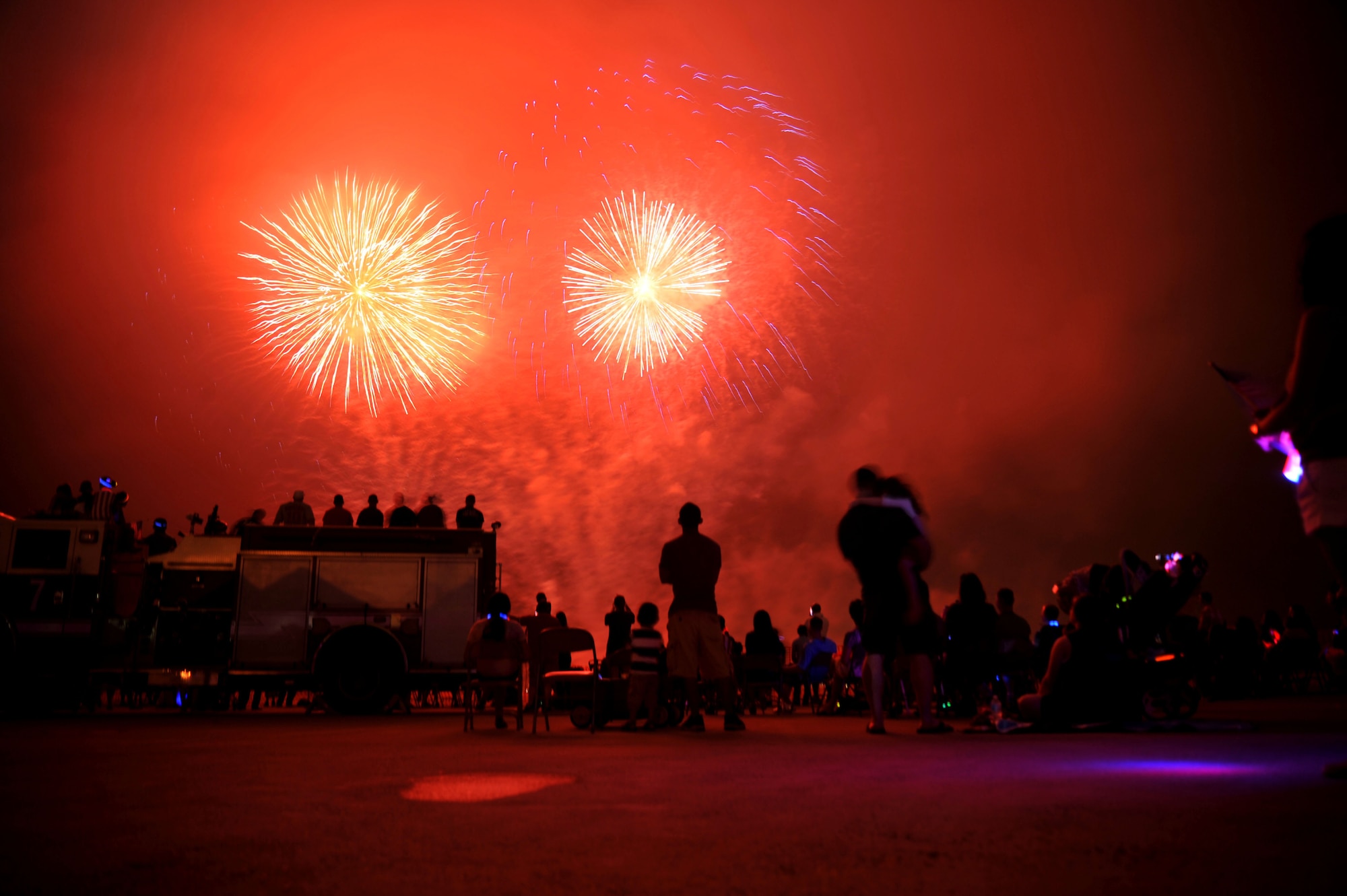 A fireworks show lights up the sky during Liberty Fest at Osan Air Base, Republic of Korea, July 4, 2013.  The celebration consisted of various events throughout the day and concluded with the fireworks display. (U.S. Air Force photo/Staff Sgt. Emerson Nuñez)