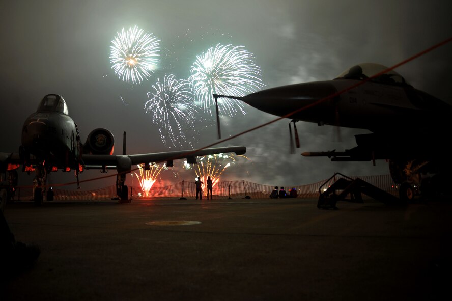 Fireworks burst during Liberty Fest celebration at Osan Air Base, Republic of Korea, July 4, 2013.  Many squadrons and volunteers worked in a number of different support positions to ensure the community event went smoothly.  (U.S. Air Force photo/Staff Sgt. Emerson Nuñez)
