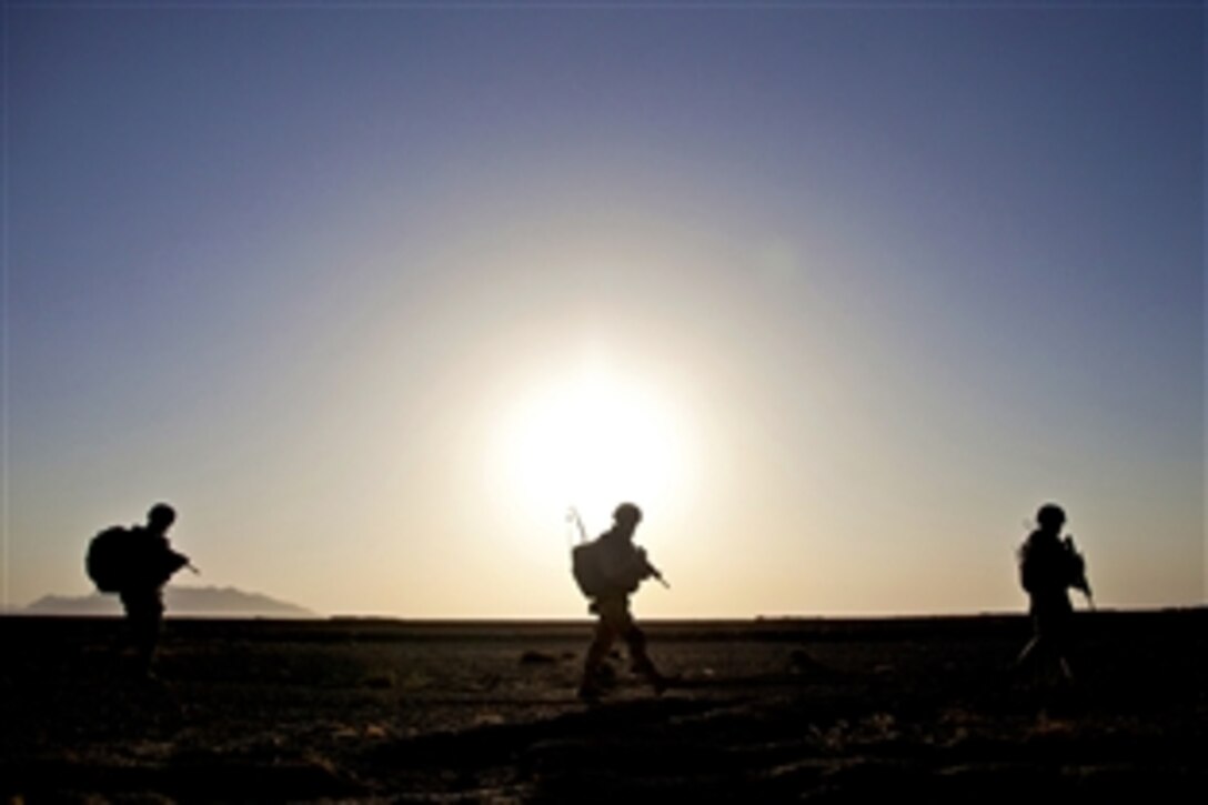 Georgian soldiers patrol during Operation Northern Lion II in Afghanistan's Helmand province, July 3, 2013. The Georgian soldiers led the operation, which included U.S. Marines and sailors, to deter insurgents, establish a presence and gather human intelligence in the area.