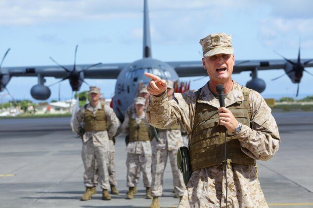 Brig. Gen. Steven R. Rudder expressed his intent to build upon 1st Marine Aircraft Wing’s past successes during the 1st MAW change of command ceremony July 9 at Marine Corps Air Station Futenma. “When the commandant and the other general officers back in D.C. talk about this MAW, they talk about all the great things that have been accomplished…and I intend to continue leading this MAW to greatness,” said Rudder. Rudder relieved Maj. Gen. Christopher S. Owens as commanding general of 1st MAW, III Marine Expeditionary Force. (U.S. Marine Corps photo by Lance Cpl. Natalie M. Rostran/Released)