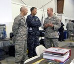 Air Force Col. Vic Dallin, the Joint Multi-Agency Operations Coordination Center operations center director, Navy Adm. James Winnefeld, U.S. Northern Command commander, and Air Force Brig. Gen. Robert Nolan, Joint Task Force – National Scout Jamboree commander, discuss Jamboree operations in the JMAOCC at the Boy Scouts of America’s 2010 National Scout Jamboree July 28. Admiral Winnefeld called USNORTHCOM’s support of the Jamboree “a tremendous honor and privilege,” committing the dedication of the Joint Task Force to ensuring a safe and fun event. 

