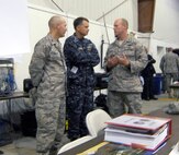 Air Force Col. Vic Dallin, the Joint Multi-Agency Operations Coordination Center operations center director, Navy Adm. James Winnefeld, U.S. Northern Command commander, and Air Force Brig. Gen. Robert Nolan, Joint Task Force – National Scout Jamboree commander, discuss Jamboree operations in the JMAOCC at the Boy Scouts of America’s 2010 National Scout Jamboree July 28. Admiral Winnefeld called USNORTHCOM’s support of the Jamboree “a tremendous honor and privilege,” committing the dedication of the Joint Task Force to ensuring a safe and fun event. 

