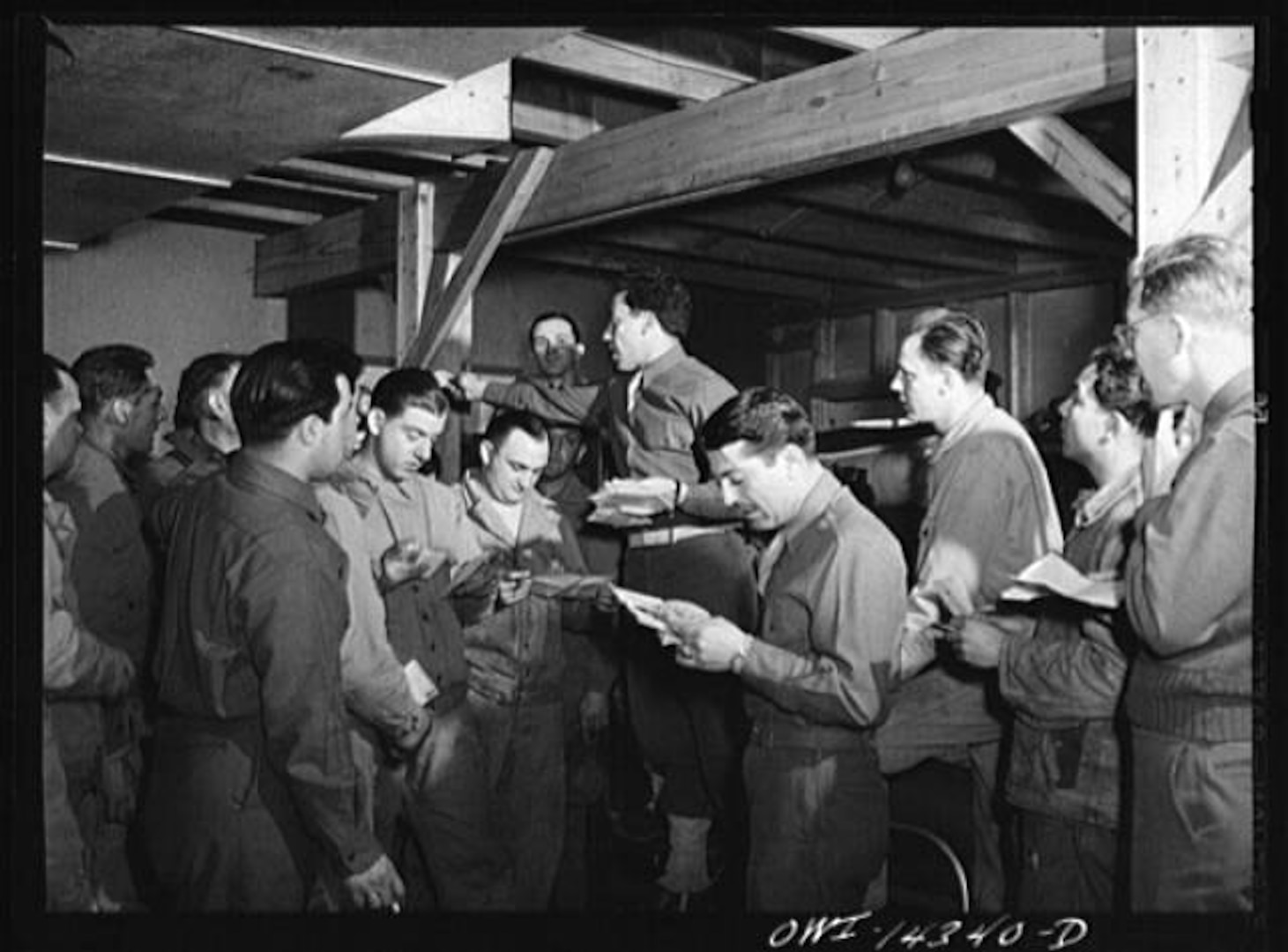 World War II Soldiers read letters from friends and family during a mail call, January 1943. The Army's HooahMail program makes it possible for Soldiers in Afghanistan to receive letters in days, instead of weeks, as in previous wars.