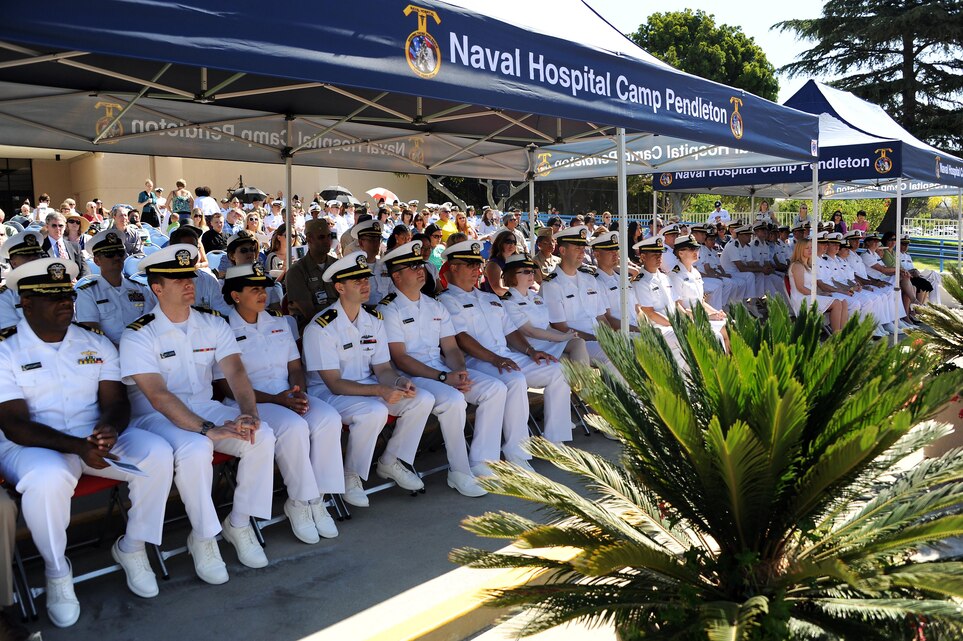 Graduates, staff members and guests listen to a speech during the annual Naval Hospital Camp Pendleton Residency Programs graduation ceremony June 28.  At the ceremony, four dental residents, two sports medicine residents, one pharmacy resident, 10 family medicine residents and 13 family medicine interns graduated from their respective programs.