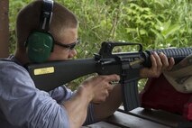 A poolee from Recruiting Substation Wausau gets familiar with a rifle similar to the one he will have by his side throughout recruit training. RS Milwaukee holds annual familiarization fire events at rifle ranges around Wisconsin to give poolees a brief introduction to marksmanship before shipping off to boot camp.