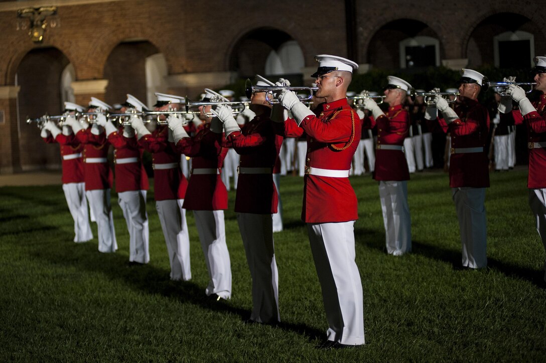 Members of the U.S. Marine Drum & Bugle Corps perform during a Friday Evening Parade at Marine Barracks Washington, D.C., July 5. (Official Marine Corps photo by Lance Cpl. Dan Hosack/Released) 