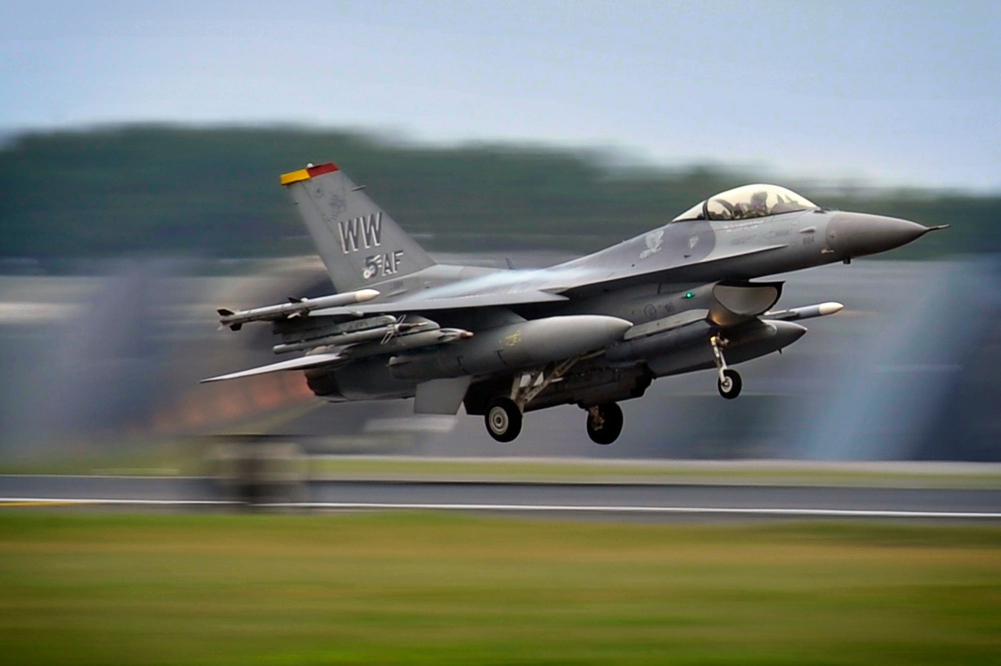 An F-16 Fighting Falcon from the 35th Fighter Wing takes off at Misawa Air Base, Japan, June 28, 2013. Pilots from the 35th Fighter Wing flew to Draughon Range to test their efficiency on engaging ground targets. (U.S. Air Force photo by Staff Sgt. Nathan Lipscomb)