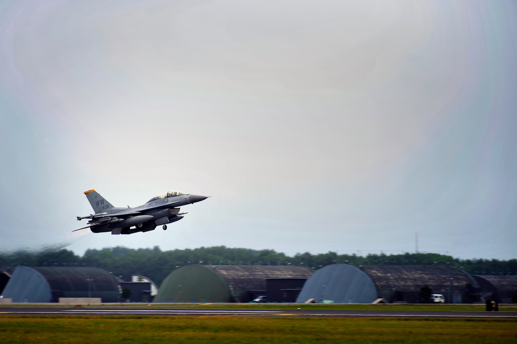 An F-16 Fighting Falcon from the 14th Fighter Squadron takes off at Misawa Air Base, Japan, June 28, 2013. Pilots from the 35th Fighter Wing flew to Draughon Range to practice attacking ground targets. (U.S. Air Force photo by Staff Sgt. Nathan Lipscomb)