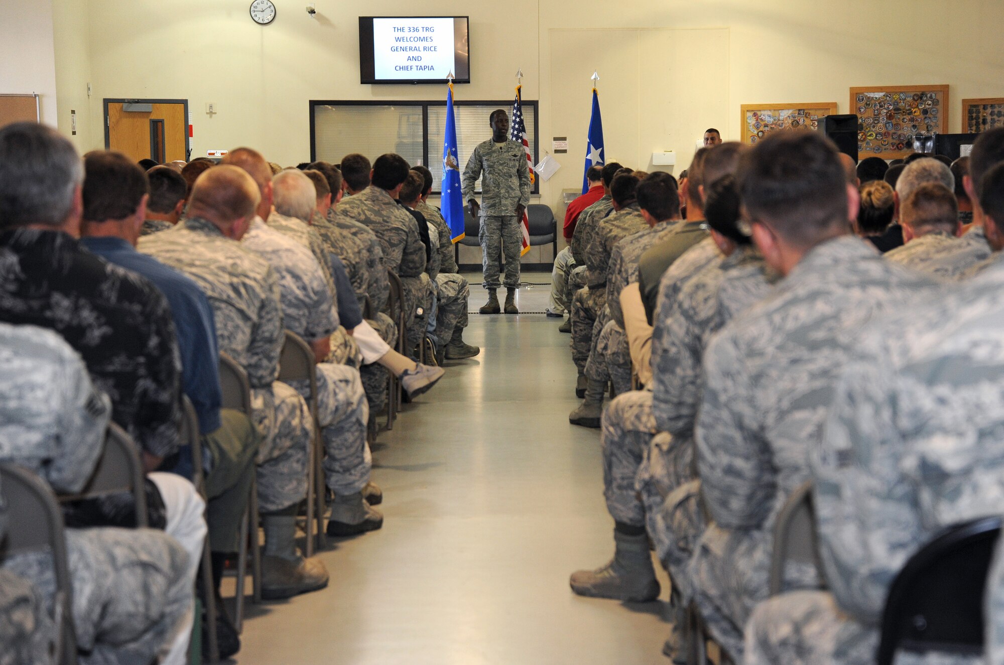 Gen. Edward Rice, commander of the Air Education and Training Command, speaks to members of the 336th Training Group during a group-wide all-call at the supply warehouse Tuesday, July 2, 2013.  Part of the general's speech dealt with the issue of sexual assault.  (U.S. Air Force photo by Staff Sgt. Michael Means/Released)