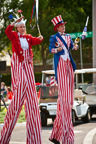 Volunteers from the Summerlin community participate in the 19th Annual Summerlin Council Independence Day Parade July 4, 2013, in Las Vegas. Organizations from southern Nevada participated in the event to celebrate the birth of the nation and, according to the event organizers raise morale in the community.  (U.S. Air Force photo by Staff Sgt. Michael Charles)