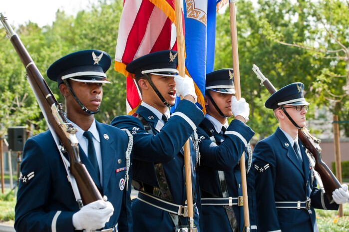 Members of the Nellis Air Force Base Honor Guard march during the 19th Annual Summerlin Council Independence Day Parade July 4, 2013, in Las Vegas. The honor guard represents the Air Force in ceremonial functions in southern Nevada, some areas of California, Arizona and Utah. (U.S. Air Force photo by Staff Sgt. Michael Charles)