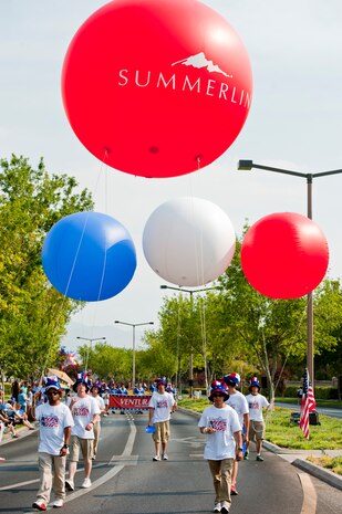 Volunteers from the Summerlin community hold patriotic balloons during the 19th Annual Summerlin Council Independence Day Parade July 4, 2013, in Las Vegas. The parade is the largest Independence Day parade in southern Nevada. (U.S. Air Force photo by Staff Sgt. Michael Charles)