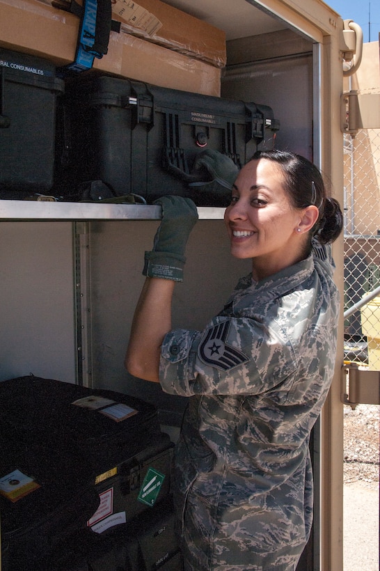 Staff Sgt. Jennifer Van Note, a life support specialist from the 140th Wing, Colorado Air National Guard, gathers her gear at a training base in Northern Jordan as part of the Eager Lion exercise. Eager Lion is a U.S. Central Command-directed, irregular warfare-themed exercise focusing on missions the United States and its coalition partners might perform in support of global contingency operations. (U.S. Air National Guard photo by Senior Master Sgt. John P. Rohrer)