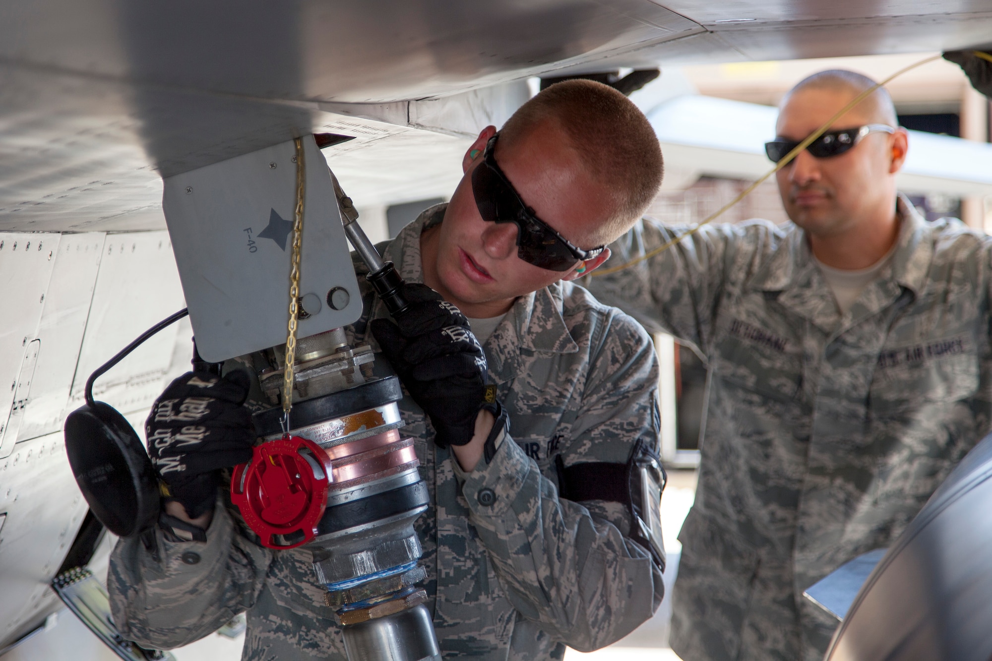 Senior Airman Brandon Olson from the 140th Wing, Colorado Air National Guard, fuels an F-16 aircraft located at a training base in Northern Jordan as part of Exercise Eager Lion. Eager Lion is a U.S. Central Command-directed, irregular warfare-themed exercise focusing on missions the United States and its coalition partners might perform in support of global contingency operations. (U.S. Air National Guard photo by Senior Master Sgt. John P. Rohrer)