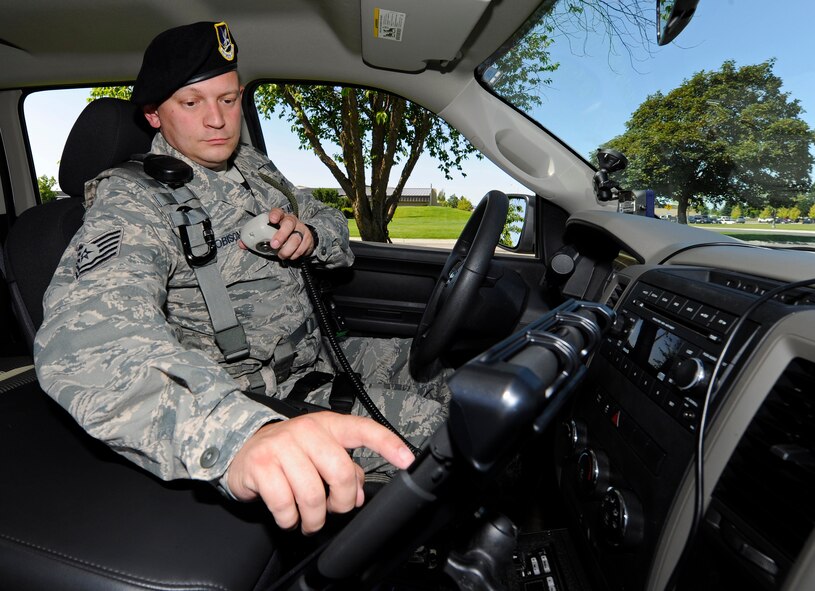 Tech. Sgt. Jeremy Robison, 92nd Security Forces Squadron flight sergeant, accesses information on an iPad at Fairchild Air Force Base, Wash., July 3, 2013. The Air Force is currently testing the use of iPads at three bases including Fairchild. The goal is to improve communication between members and help them complete their job more efficiently. (U.S. Air Force photo by Airman 1st Class Ryan Zeski/Released))