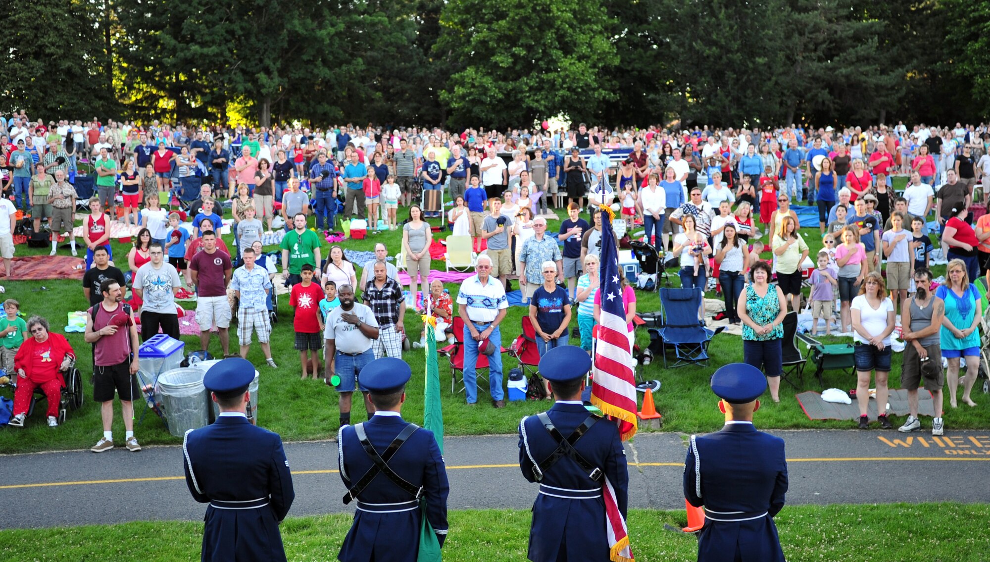 Fairchild Air Force Base honor guard color guard team presents the colors during the welcoming ceremony at the 4th of July Celebration in downtown Spokane, Wash. (U.S. Air Force photo by Senior Airman Taylor Curry)