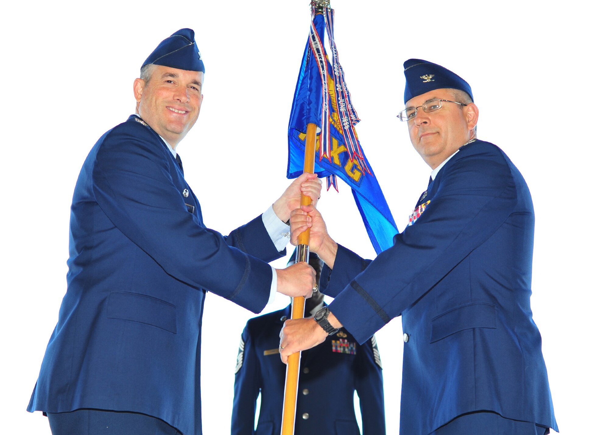 Col. Kenneth Timko assumes command as the new 92nd Maintenance Group commander at Fairchild Air Force Base, Wash., July 8, 2013. (U.S. Air Force photo by Senior Airman Taylor Curry) 