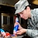 U.S. Air Force Capt. Kady Pauley, 633rd Force Support Squadron sustainment services flight commander, decorates cupcakes during the 633rd FSS Cupcake Challenge at the Langley Air Force Base Va., Crossbow Dining Facility, July 3, 2013. Pauley and her teammate took first place during the competition. (U.S. Air Force photo by Airman Areca T. Wilson/Released)