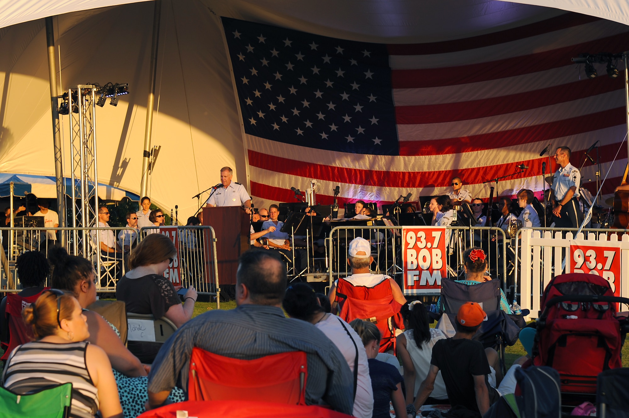 U.S. Air Force Col. John J. Allen, 633rd Air Base Wing commander, introduces the U.S. Air Force Heritage of America Band at the “Stars in the Sky” event at Victory Landing Park in Newport News, Va., July 4, 2013. More than 10,000 community members took part in the free event hosted by the Newport News Parks, Recreation and Tourism office. (U.S. Air Force photo by Airman 1st Class Victoria H. Taylor/Released)