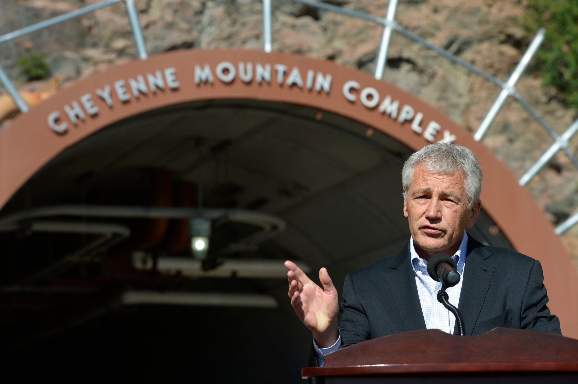 COLORADO SPRINGS, Colo. -- Secretary of Defense Chuck Hagel speaks to reporters outside the entrance to Cheyenne Mountain Air Force Station June 28. Hagel addressed issues ranging from the wildfires raging across Colorado to suicide prevention in the armed forces. During his first visit to Colorado Springs since his appointment as secretary of defense in February, Hagel visited the North American Aerospace Defense Command and U.S. Northern Command, spoke to troops at Fort Carson and toured Cheyenne Mountain AFS. (DoD photo/Glenn Fawcett - released)
