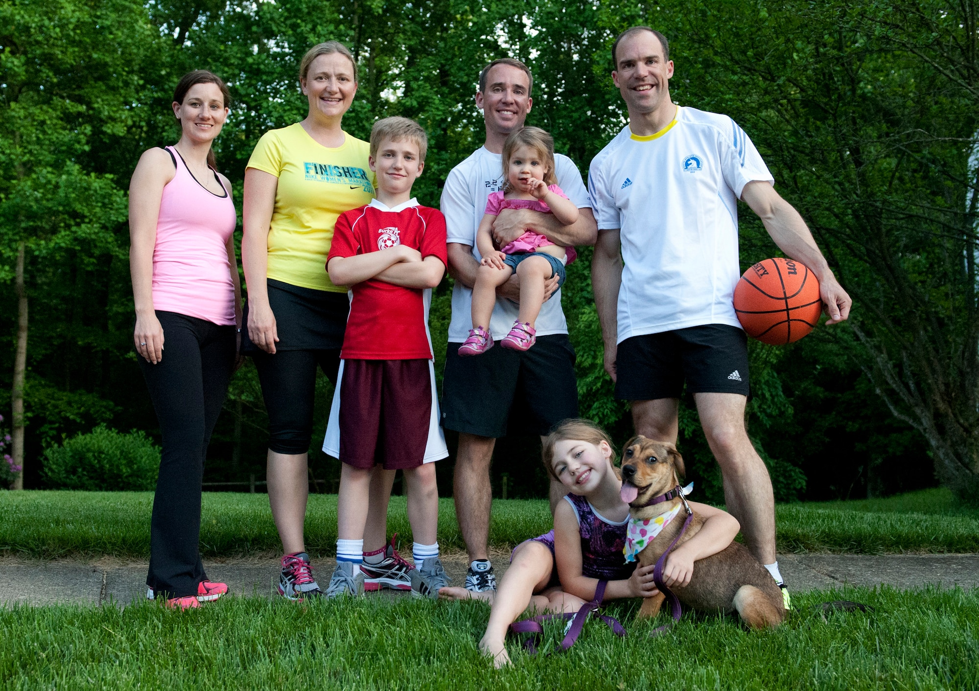 The Novotny family poses for a family photo, during a family gathering, May 20, 2013 in Fairfax Va. The Novotny family shares a healthy lifestyle in sports and running as a family. (U.S. Air Force photo by Senior Airman Carlin Leslie)