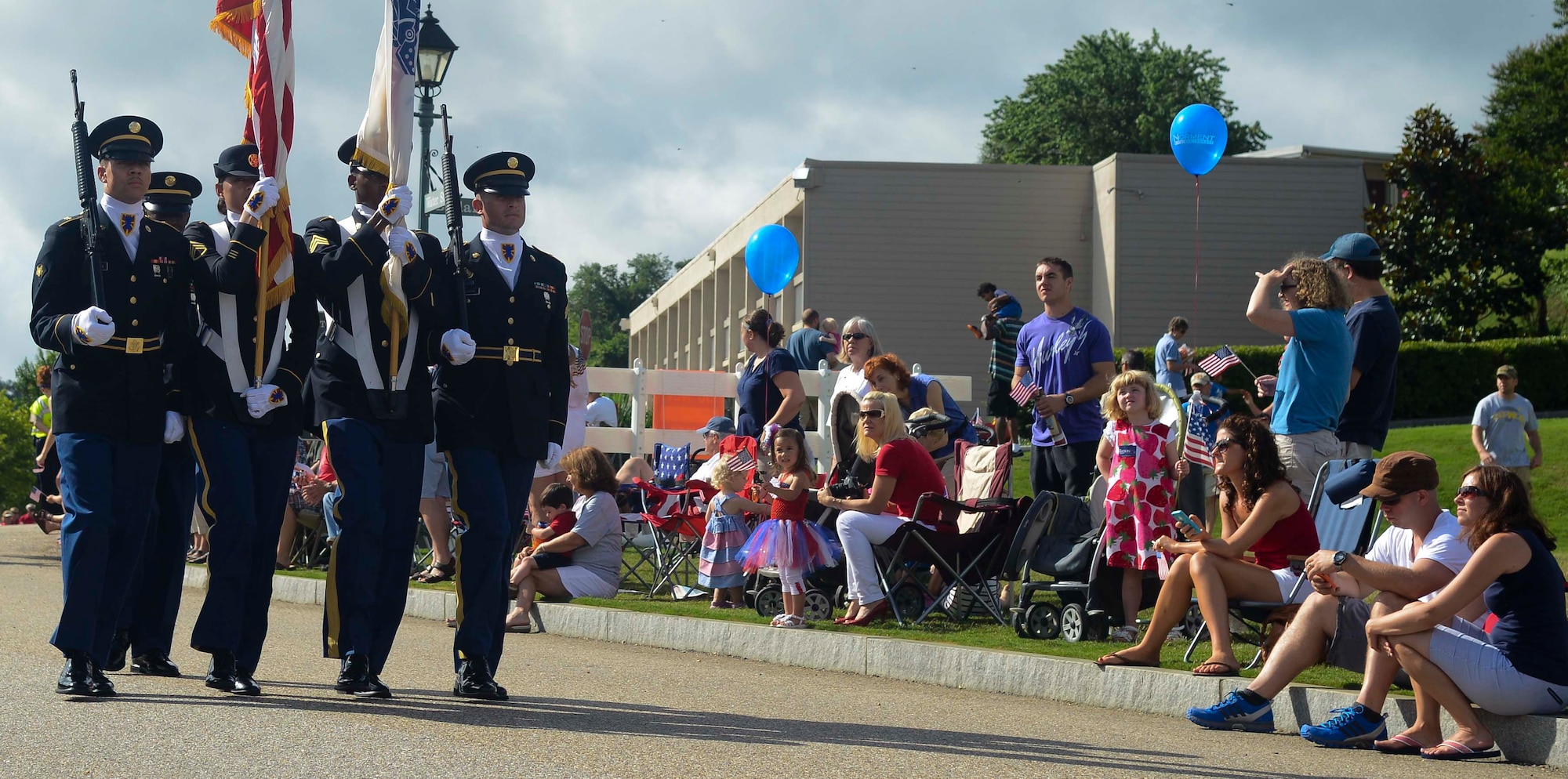 The Fort Eustis, Va., color guard marches through the Yorktown beachfront July 4, 2013 at Yorktown, Va. The U.S. Army Training and Doctrine Command band also played during Yorktown’s Independence Day events. (U.S. Air Force photo by Airman 1st Class Austin Harvill/Released)