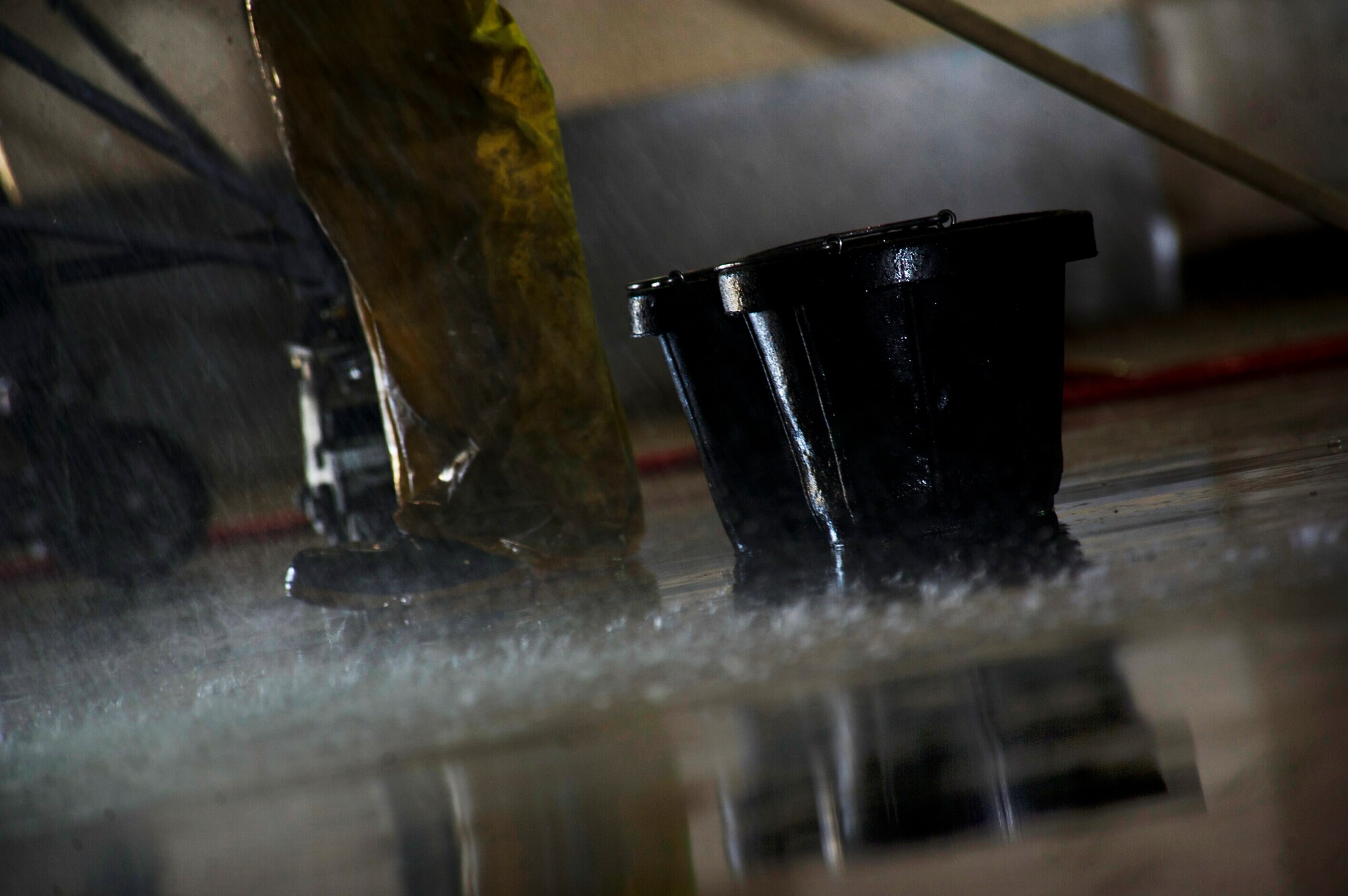 Airmen from the 5th Aircraft Maintenance Squadron wash a B-52H Stratofortess at Minot Air Force Base, N.D., June 19, 2013. The 5th Aircraft Maintenance Squadron consists of 2 Aircraft Maintenance unit Specialist Sections the 23d and 69th AMU with a total of 237 maintenance professionals spanning across 6 Air Force specialties including Communications/Navigation, Instruments/Flight Controls, Electronic Counter Measures, Jet Engine Mechanics, Hydraulics and Electrical/Environmental systems. (U.S. Air Force photos/Senior Airman Brittany Y. Auld)