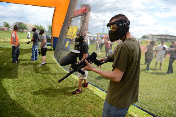 SPANGDAHLEM AIR BASE, Germany – Super Saber Appreciation Day participants engage in a paintball war July 4, 2013. More than 3,500 people participated in events hosted by the 52nd Force Support Squadron throughout the day. (U.S. Air Force photo by Airman 1st Class Gustavo Castillo/Released)