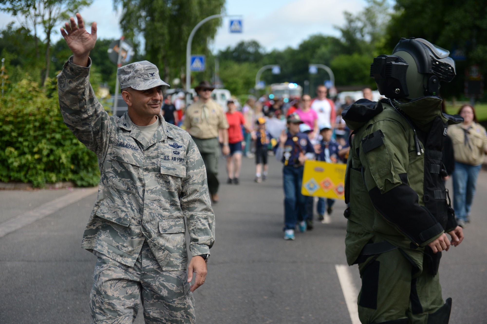 SPANGDAHLEM AIR BASE, Germany – U.S. Air Force Col. David Julazadeh, 52nd Fighter Wing commander, waves to a crowd during a Super Saber Appreciation Day parade July 4, 2013. The parade signified the start of the celebration that would continue on throughout the day. (U.S. Air Force photo by Airman 1st Class Gustavo Castillo/Released)