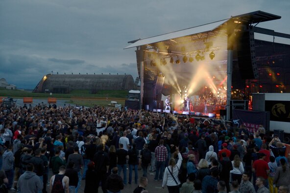 SPANGDAHLEM AIR BASE, Germany – Community members watch Korn perform a concert July 3, 2013. Armed Forces Entertainment and the 52nd Force Support Squadron worked to bring Korn to Spangdahlem AB as the kick off to Super Saber Appreciation day. (U.S. Air Force photo by Staff Sgt. Christopher Ruano)