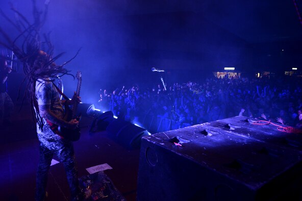 SPANGDAHLEM AIR BASE, Germany – Brian Welch head bangs during a performance July 3, 2013. At first, the band name corn was rejected and later suggested to be spelled with a K and a backward R: Ko?n. (U.S. Air Force photo by Airman 1st Class Kyle Gese/Released)