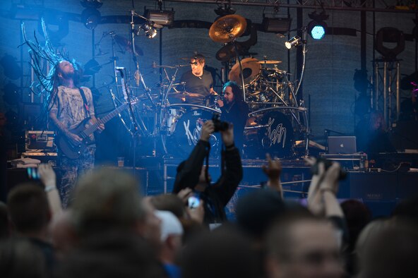 SPANGDAHLEM AIR BASE, Germany – Community members watch Korn perform a concert July 3, 2013. Armed Forces Entertainment and the 52nd Force Support Squadron worked to bring Korn to Spangdahlem AB as the kick off to Super Saber Appreciation day. (U.S. Air Force photo by Airman 1st Class Kyle Gese/Released)