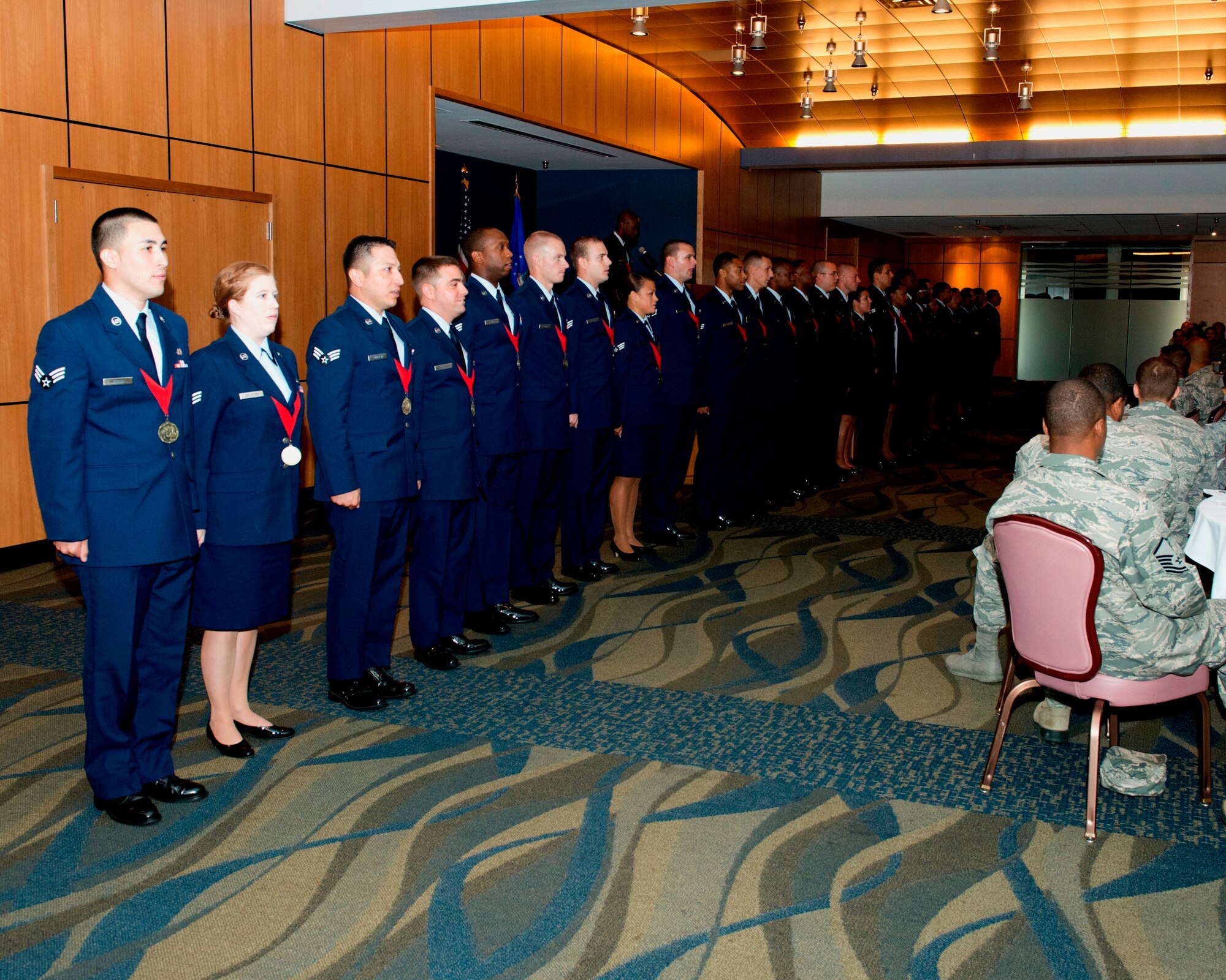Twenty-eight Tyndall Airmen graduated from Airman Leadership School in a ceremony July 3, at the Horizons Community Activity Center. (U.S. Air Force photo by Lisa Norman) 
