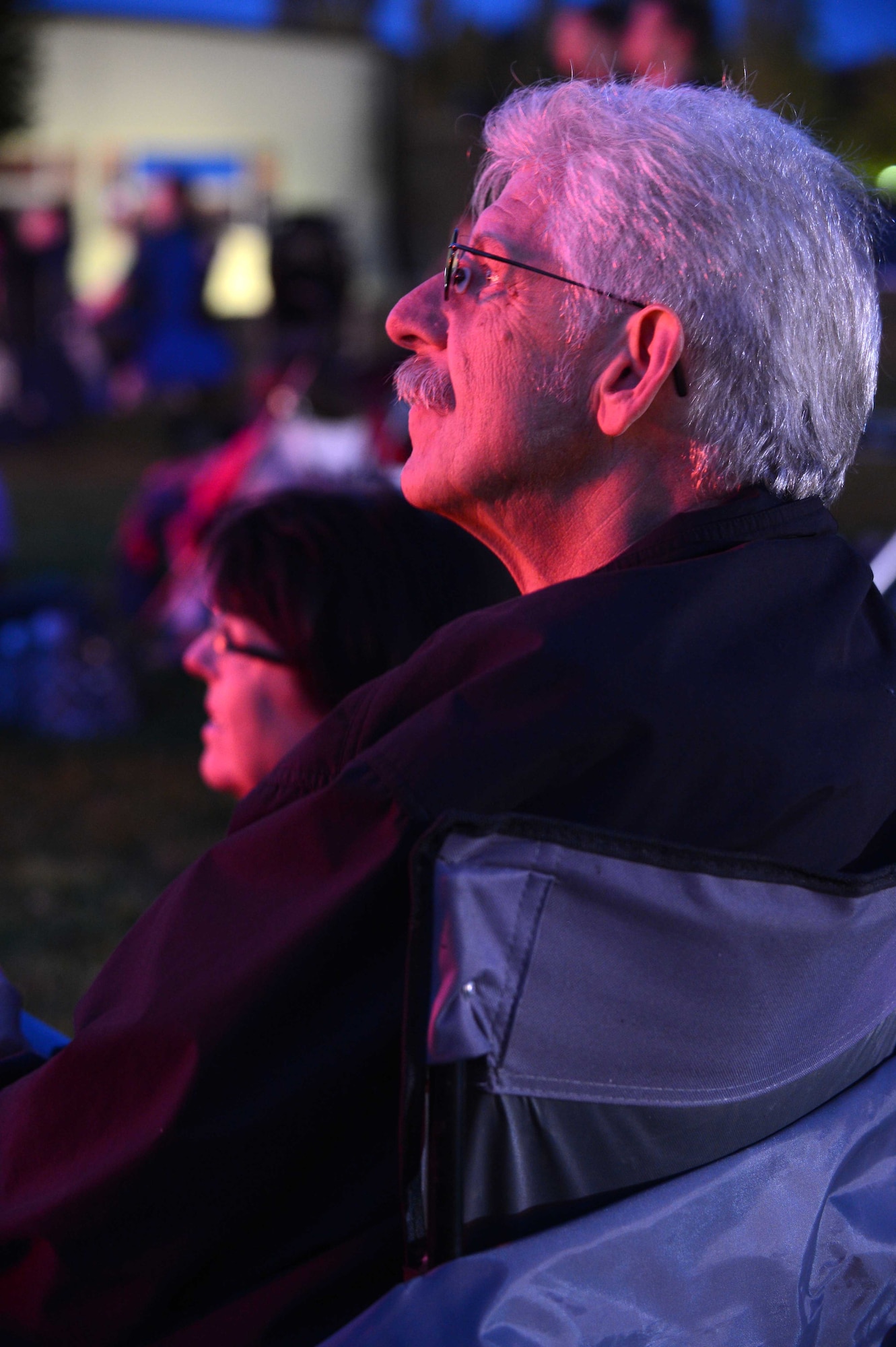 SPANGDAHLEM AIR BASE, Germany –Bruce Miller, an American visitor to the base, watches the firework show July 4, 2013. More than 100 people volunteered to make Super Saber Appreciation Day possible. (U.S. Air Force photo by Airman 1st Class Kyle Gese/Released)