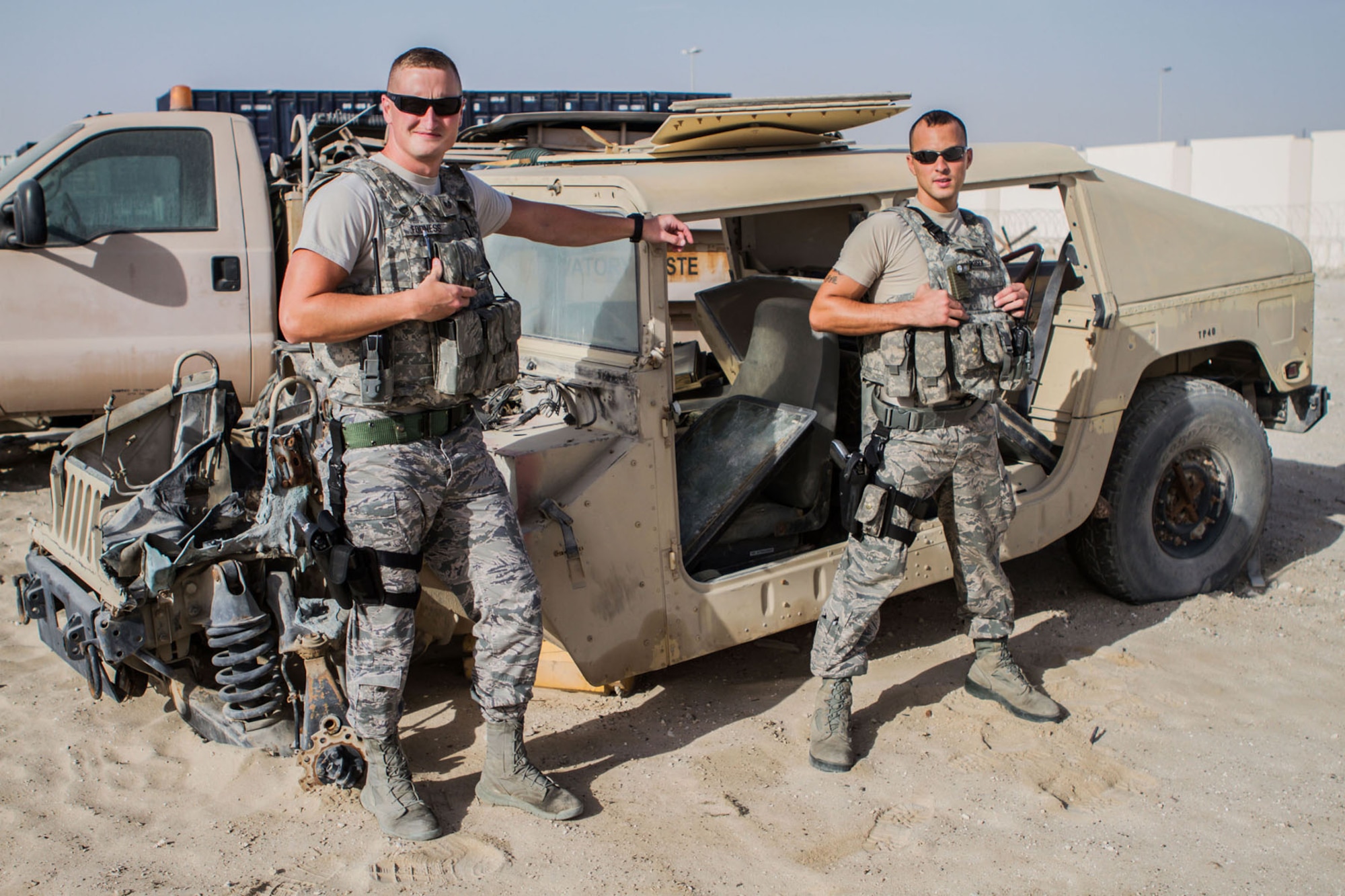 U.S. Air Force Staff Sgts. Ryan Fodness and David Mikusek, with the 169th Security Forces Squadron, South Carolina Air National Guard, are photographed while deployed to the 380th Air Expeditionary Wing in Southwest Asia, June 9, 2013. (U.S. Air Force photo courtesy 380th ESFS/Released)