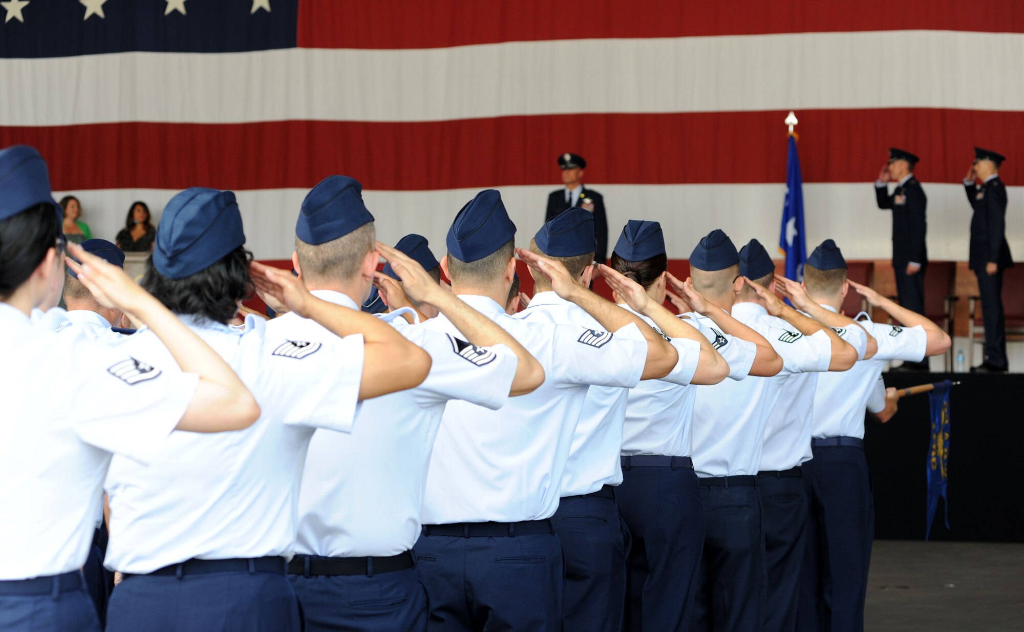 39th Air Base Wing Airmen render a salute to Lt. Gen. Craig Franklin, 3rd Air Force commander, during the 39th ABW change of command ceremony July 9, 2013, at Incirlik Air Base, Turkey. During the ceremony, command of the 39th Air Base Wing was relinquished by Col. Chris Craige and passed to Col. Craig Wills, who will serve as wing commander for the next two years. (U.S. Air Force photo by Senior Airman Jarvie Wallace/Released) 